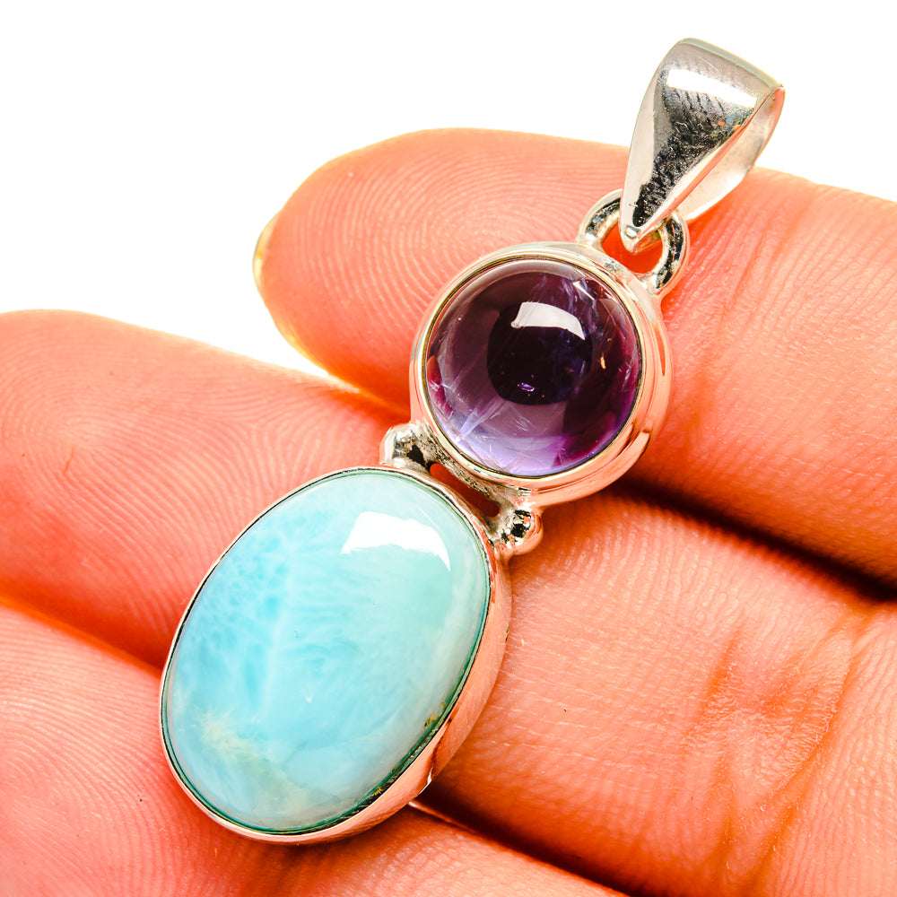 Sterling silver pendant with oval larimar and round tanzanite, hinged bail cap