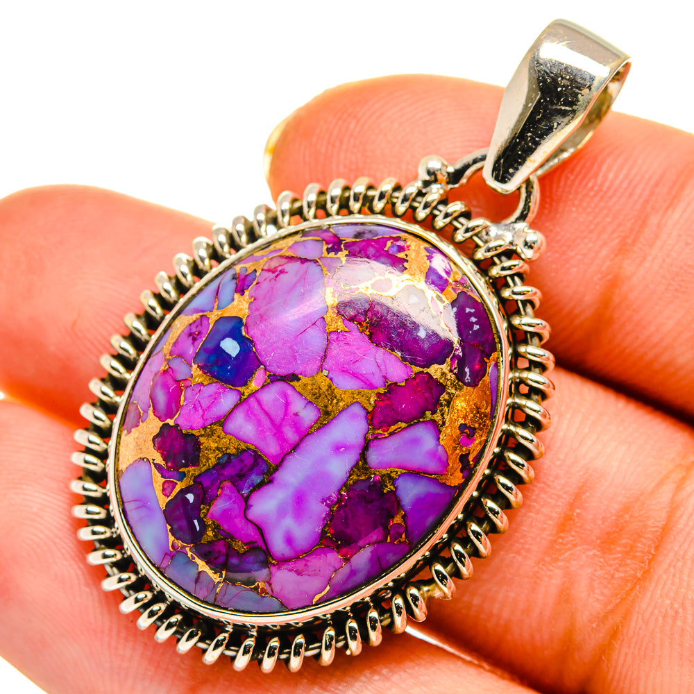 Purple turquoise oval cabochon pendant with textured silver-tone bezel and bail
