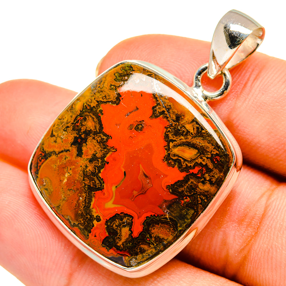 Sterling silver Moroccan agate pendant with orange-red stone and dark marbling