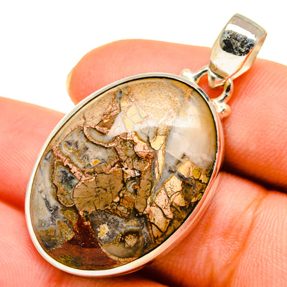 Oval 925 sterling silver pendant with mushroom rhyolite cabochon, earthy veining, top bail.