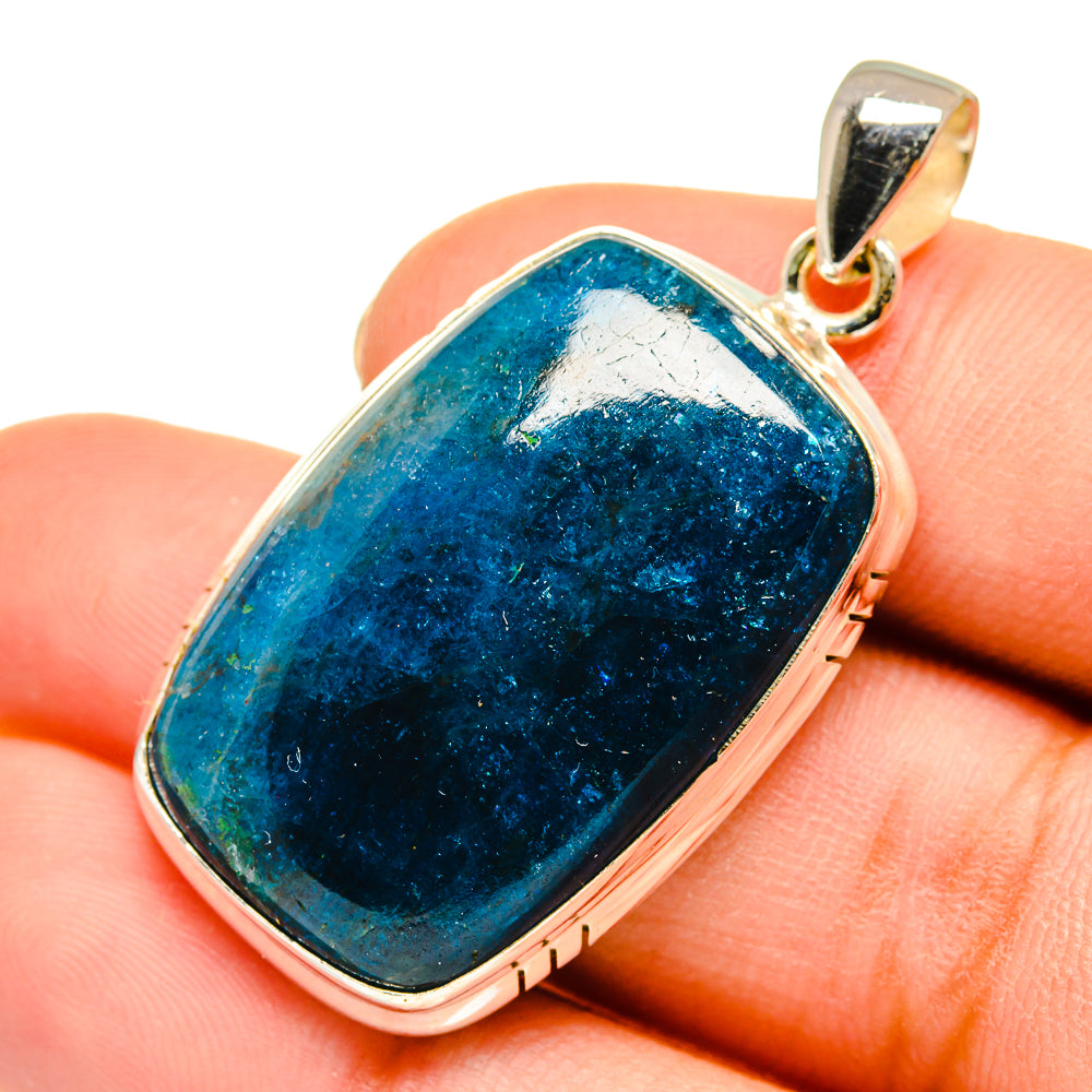 Apatite pendant with blue-green gemstone set in silver bezel, gold bail loop