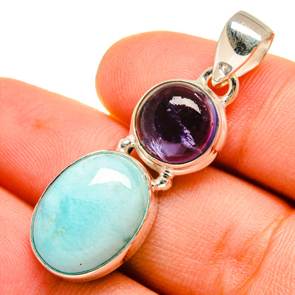 Sterling silver pendant: oval larimar and round purple tanzanite gemstones in bezels