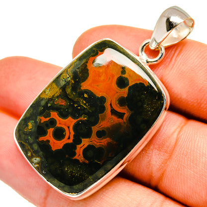 Sterling silver bezel pendant with ocean jasper, orange and green pattern