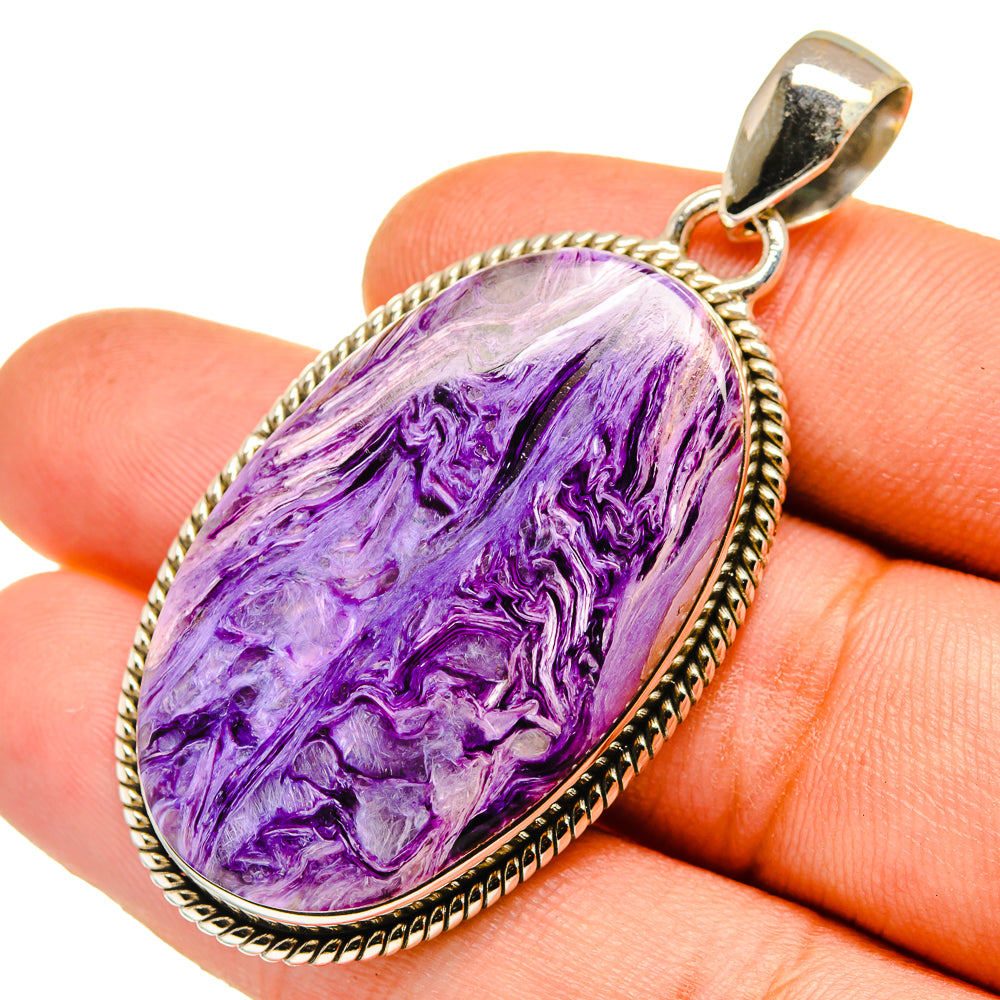Oval purple charoite stone pendant with rope silver bezel and bail, polished top cap