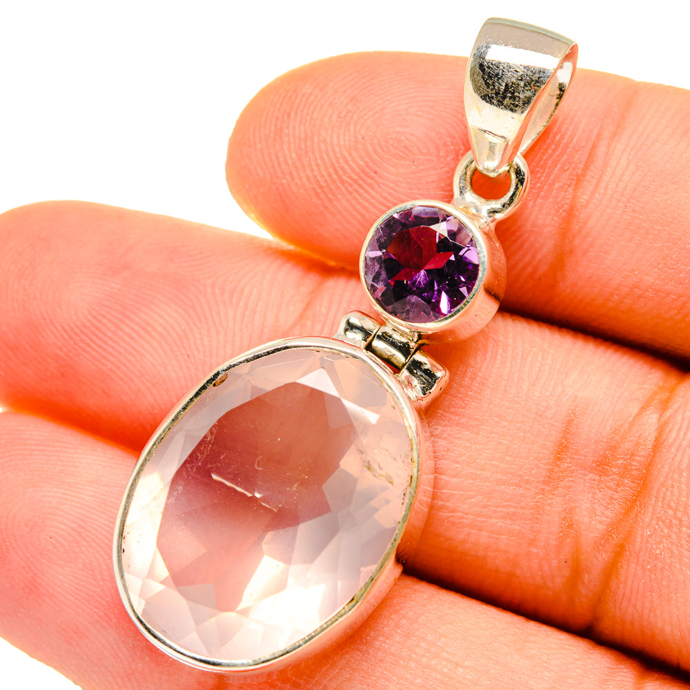 Rose quartz and amethyst pendant close-up with oval pink stone and round purple top