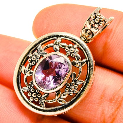 Sterling silver amethyst pendant on bail setting, round purple faceted stone with floral accents