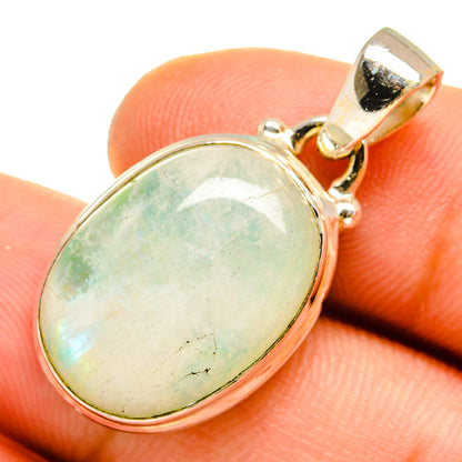 Oval green moonstone pendant with gold-tone bail and 925 silver bezel