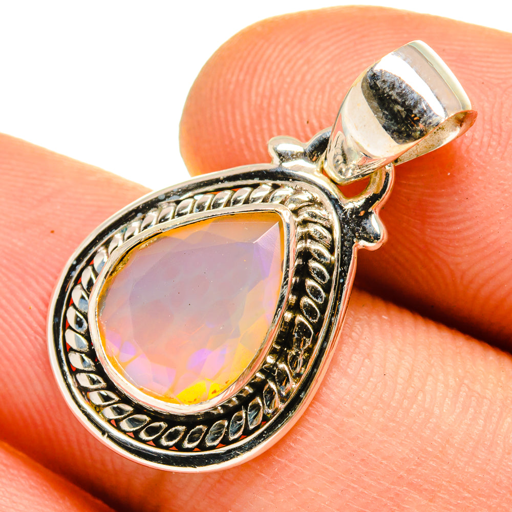 Faceted Ethiopian opal pendant in 925 sterling silver with teardrop iridescent stone
