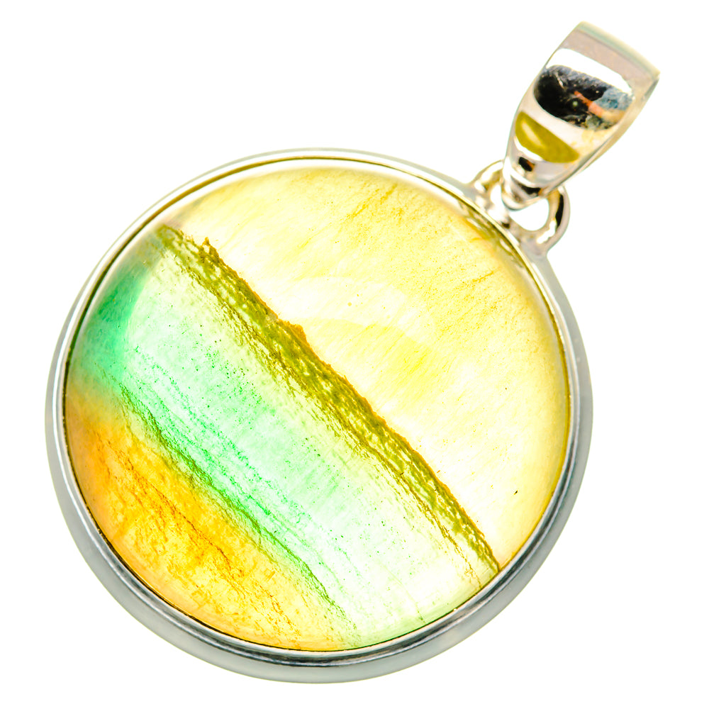 Round fluorite pendant with yellow-green gemstone, green streak, and sterling silver bail