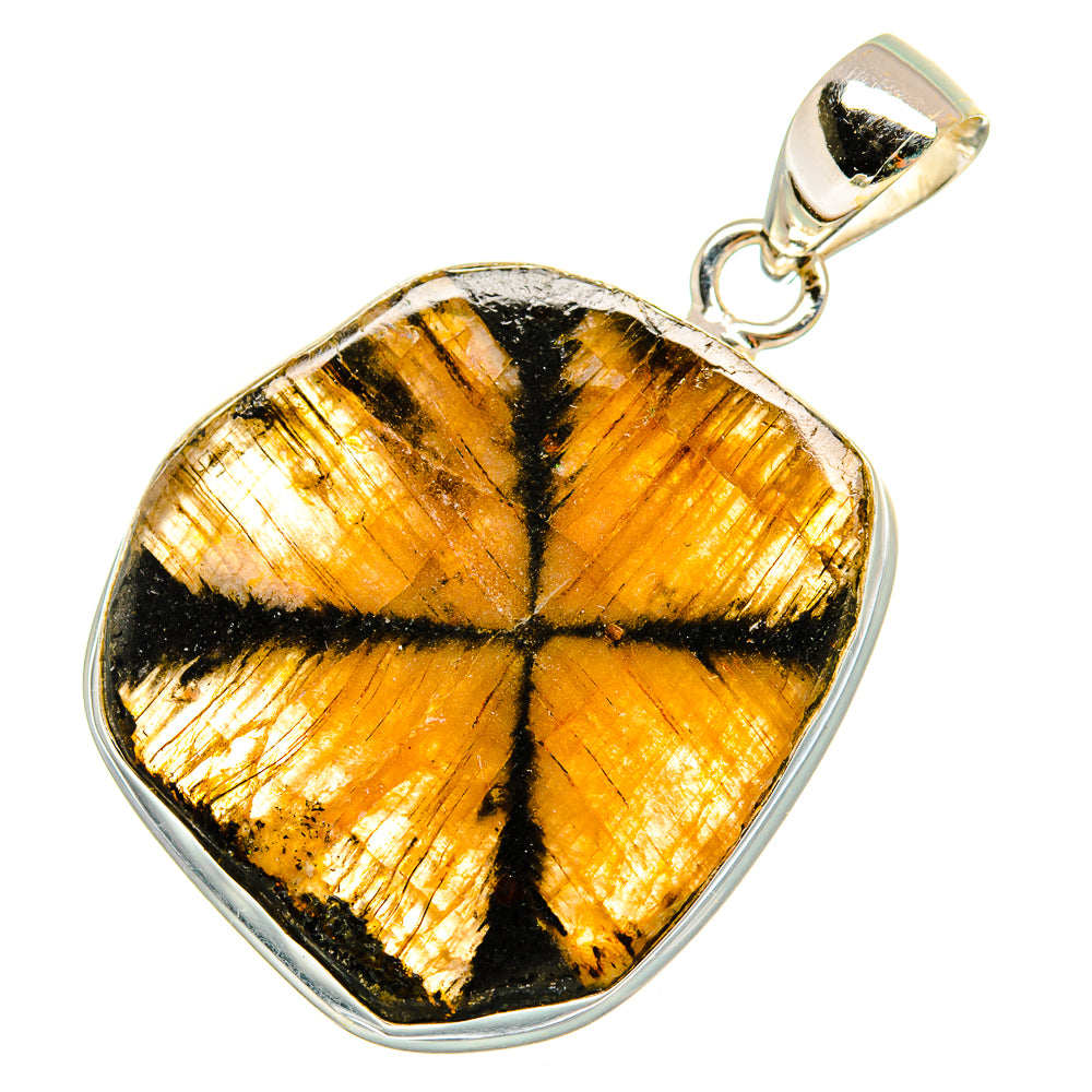 Heart-shaped chiastolite pendant with gold-and-black stone and silver bezel, bail