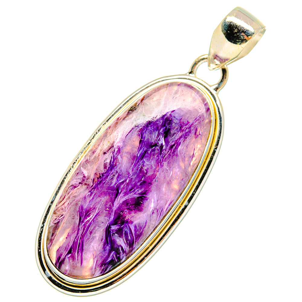 Oval charoite pendant in silver bezel with bail, purple stone with natural veining.