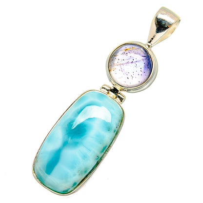 Sterling silver pendant with oval larimar and round tanzanite cabochon, bail loop top
