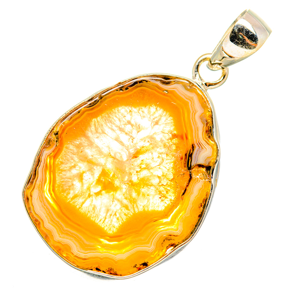 Yellow geode pendant with silver bail, oval slice with orange glow edge
