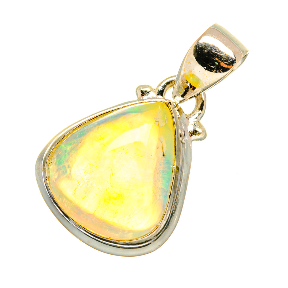 Teardrop opal pendant in silver with yellow opal center and bezel setting