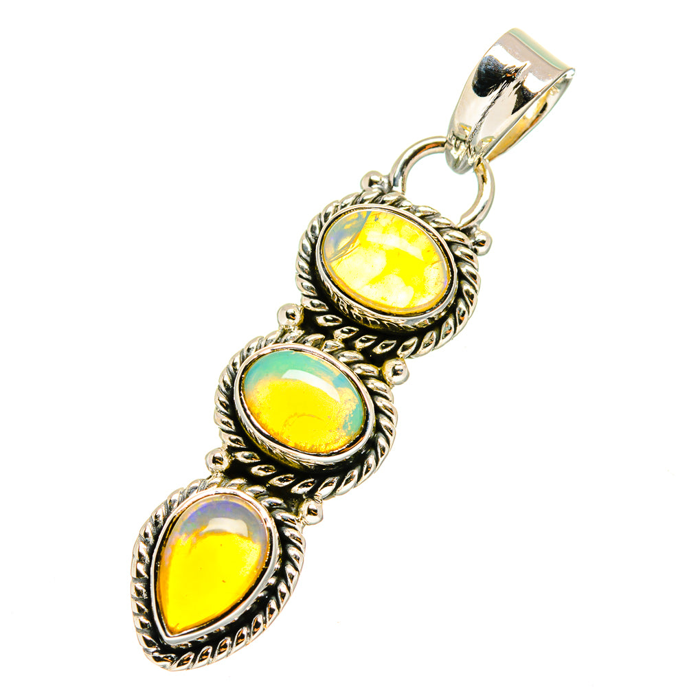 Sterling silver opal pendant with three yellow teardrop cabochons, top bail