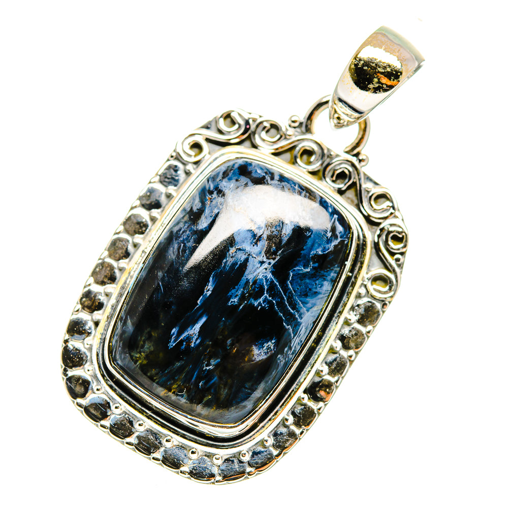 Sterling silver pietersite pendant with blue rectangular stone, scrollwork frame and bail