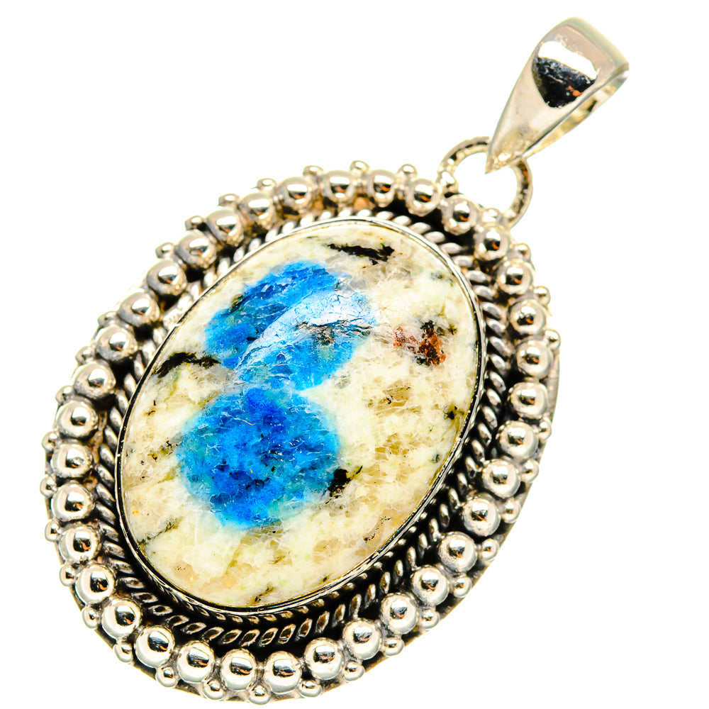 Sterling silver azurite pendant with oval blue cabochon and hanging bail, ornate edge