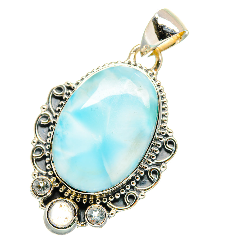 Sterling silver oval larimar pendant with light blue stone and round bezel accents