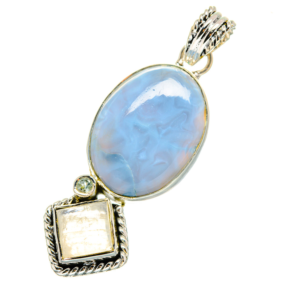 Sterling silver pendant with oval light-blue gemstone and small square charm