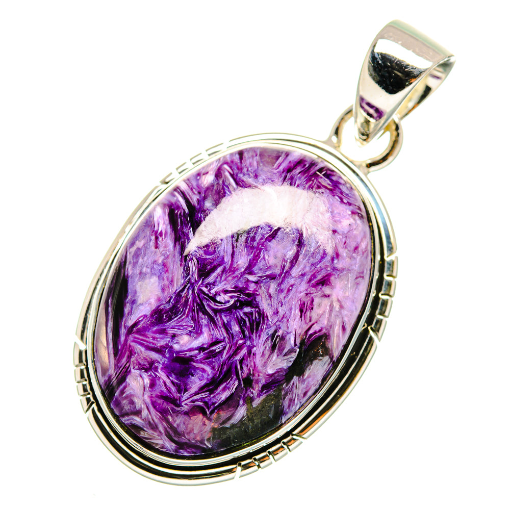 Oval purple charoite pendant with polished silver bail and detailed bezel