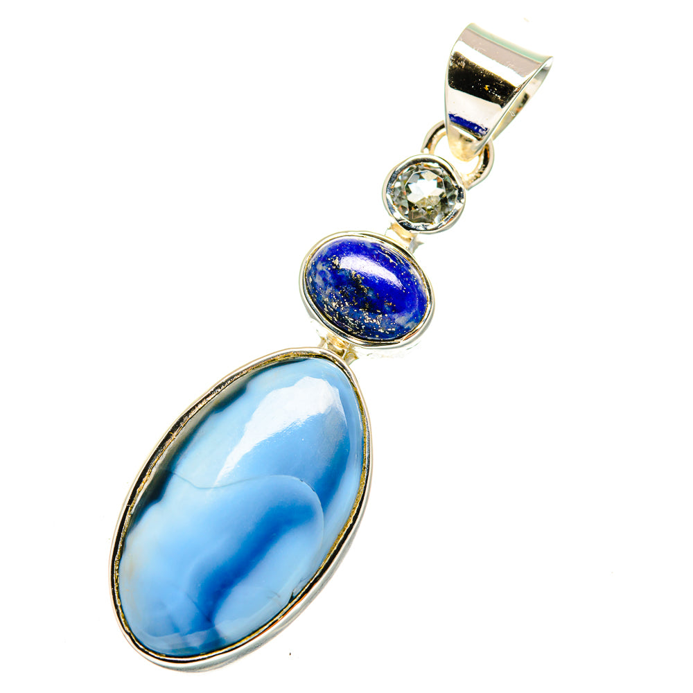 Oval blue pendant with gold-tone bezel, round dark-blue stone and clear accent stones