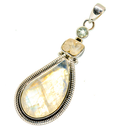 Moonstone teardrop pendant in sterling silver with pear-cut bezel and small round stones