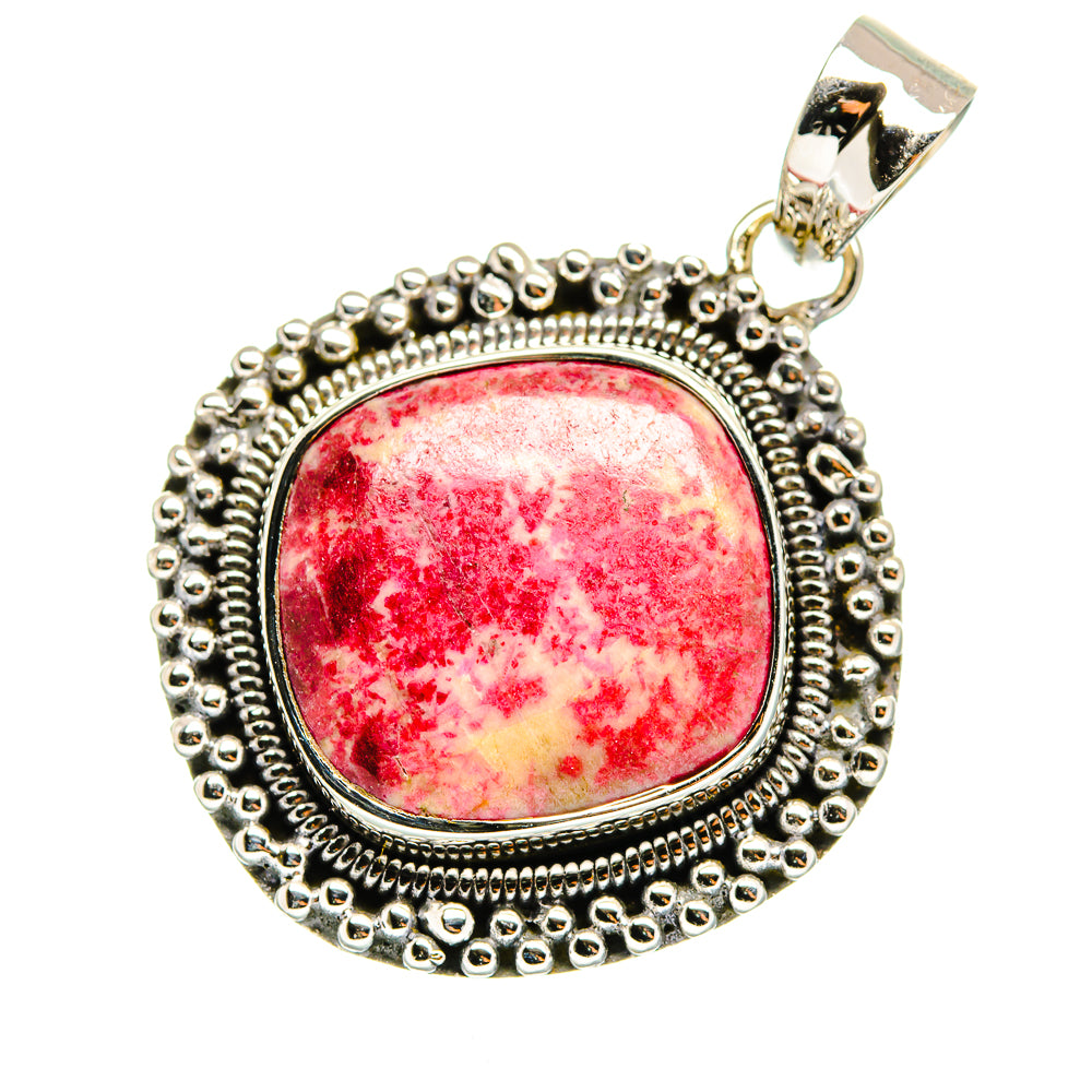 Sterling silver round pendant with round red gemstone cabochon and beaded halo frame