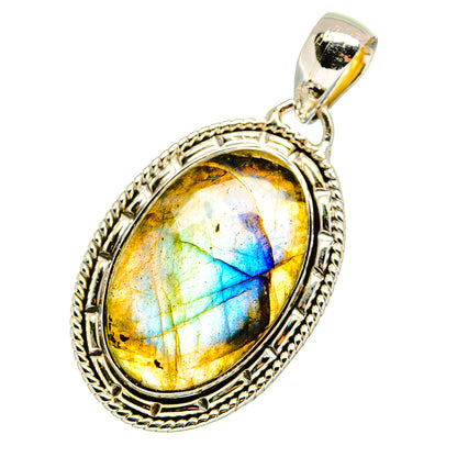 Oval labradorite gemstone pendant, ornate silver bezel with bail and bright blue streak
