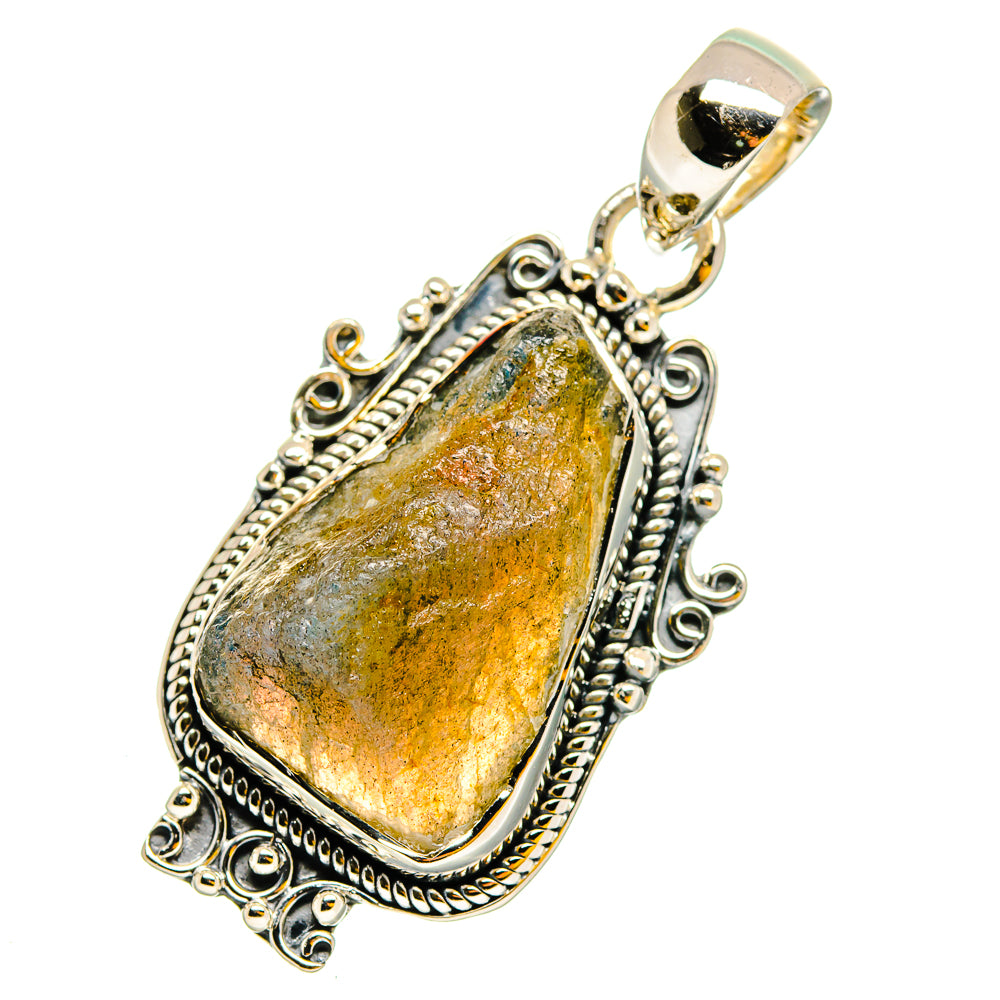 Sterling silver rough labradorite pendant with ornate bezel and loop bail