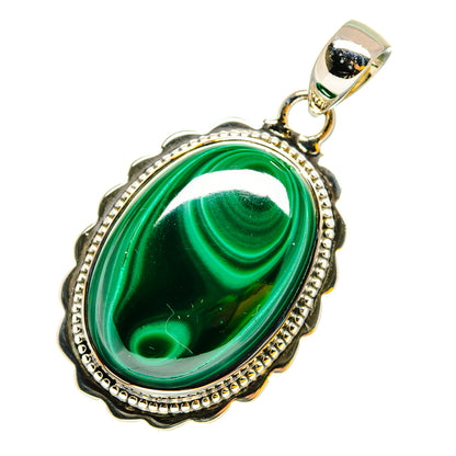 Malachite oval pendant with silver-tone scalloped bezel and top bail