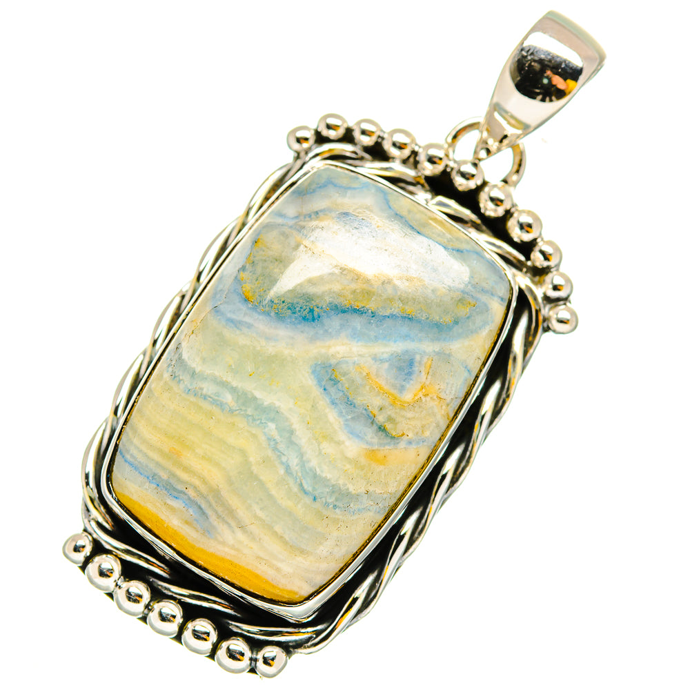 Rectangular scheelite pendant with blue veined cabochon, silver bezel and loop bail