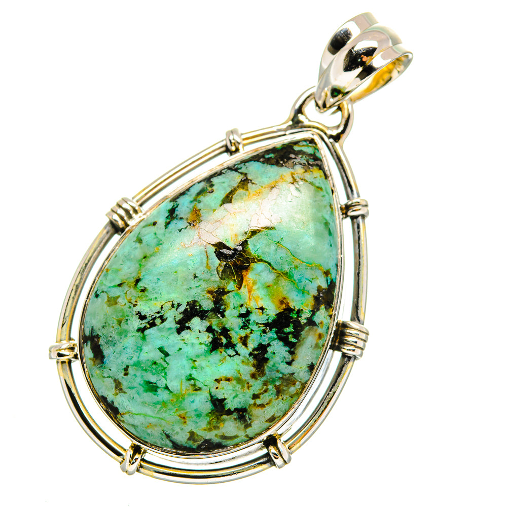 Turquoise teardrop pendant in sterling silver with ornate bezel and top bail