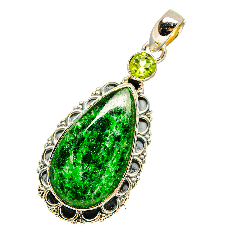 Maw Sit Sit peridot pendant with ornate silver frame, teardrop green stone and round bail