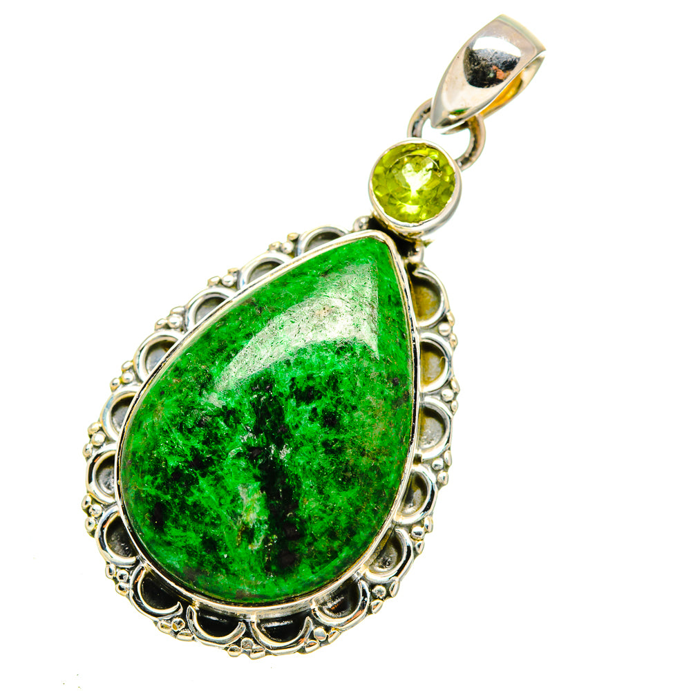 Sterling silver peridot pendant with green teardrop gemstone and ornate bezel