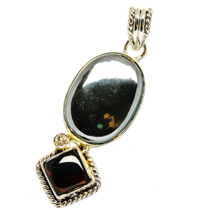 Sterling silver pendant, bezel-set black oval stone with black square accent
