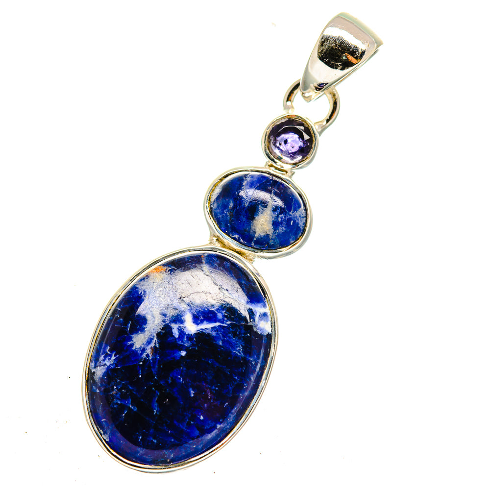 Oval sodalite pendant with two small purple stones in silver-tone bezel setting