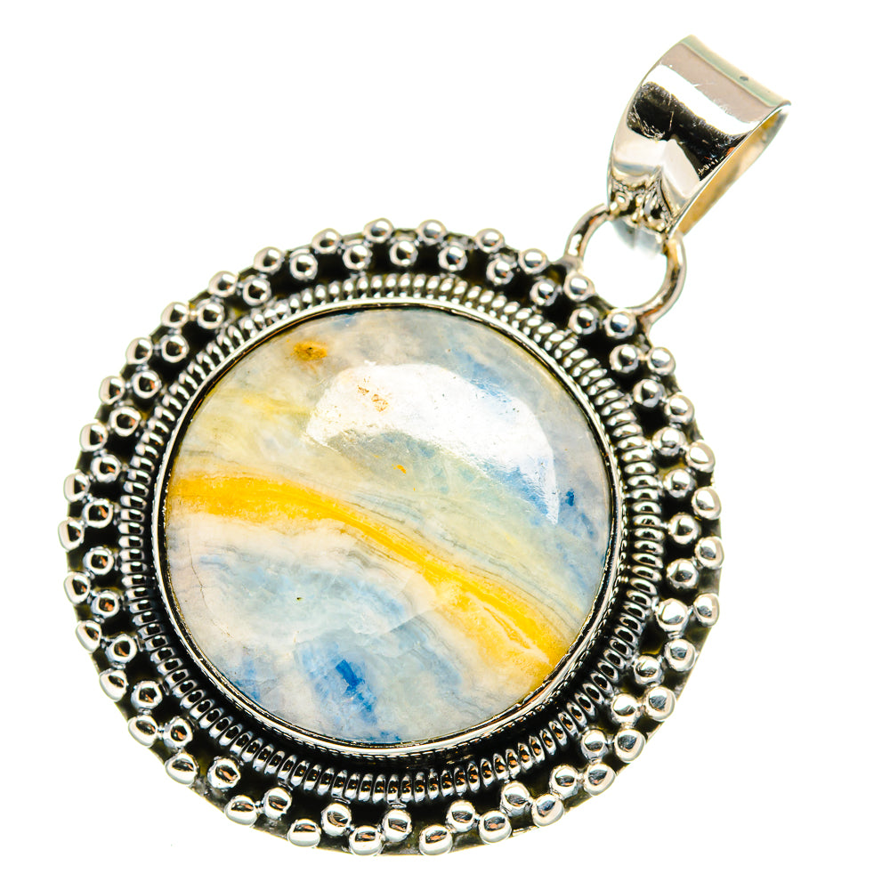 Oval blue scheelite pendant in sterling silver, textured bezel and bale with loop