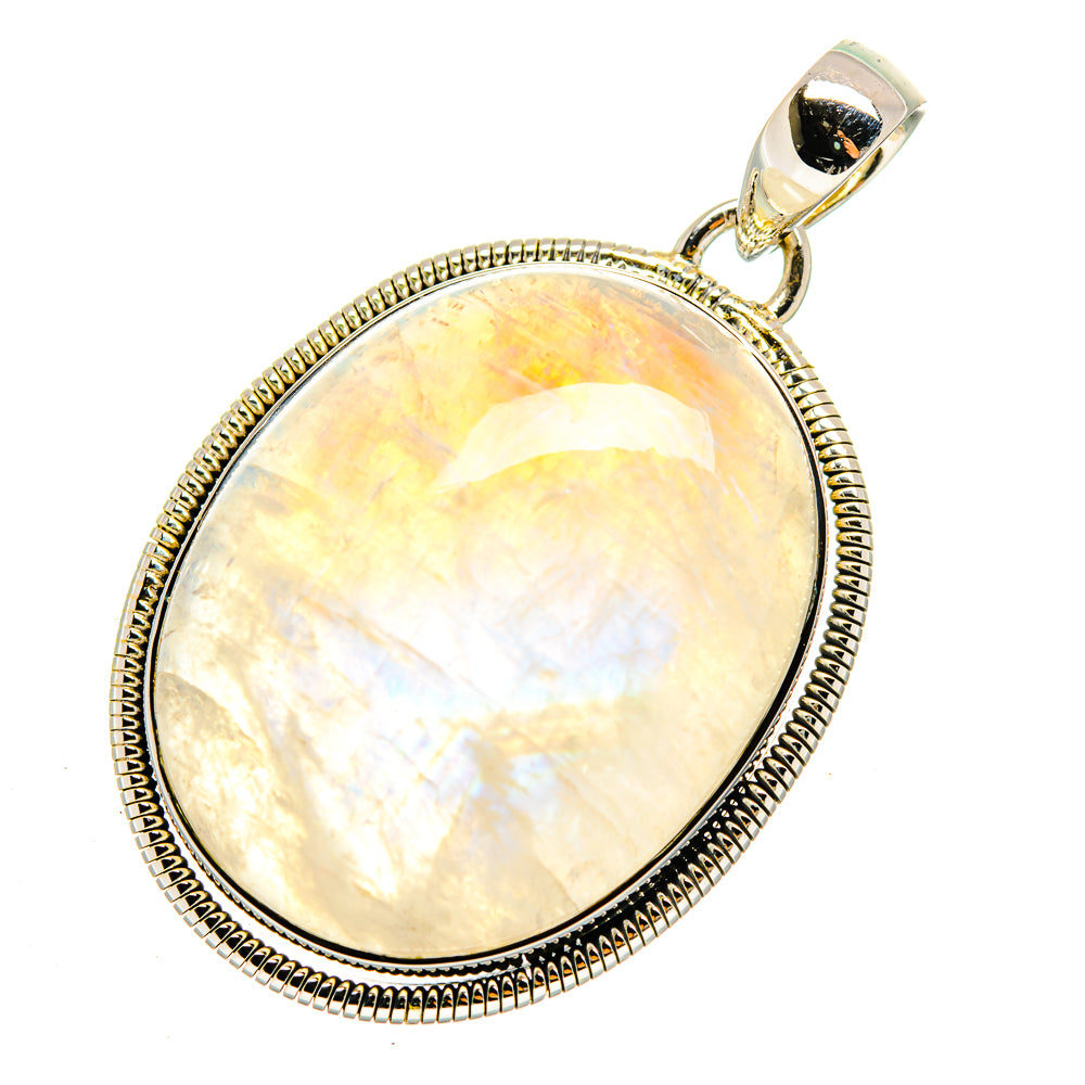 Oval rainbow moonstone pendant with textured sterling silver border and loop bail