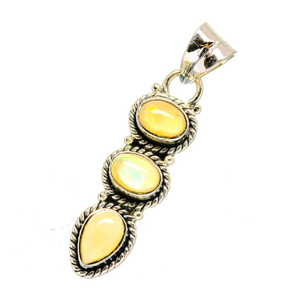 Sterling silver opal pendant with three oval yellow opal cabochons in beaded frames