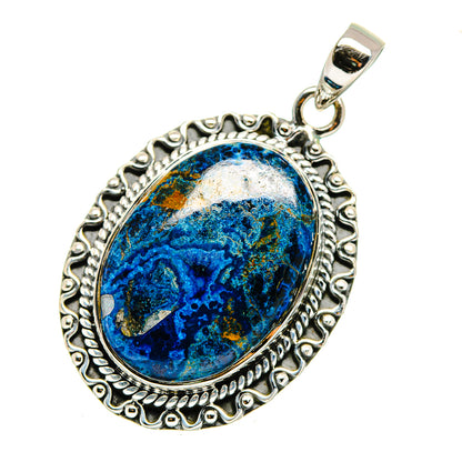 Sterling silver pietersite pendant with oval blue cabochon and raised border
