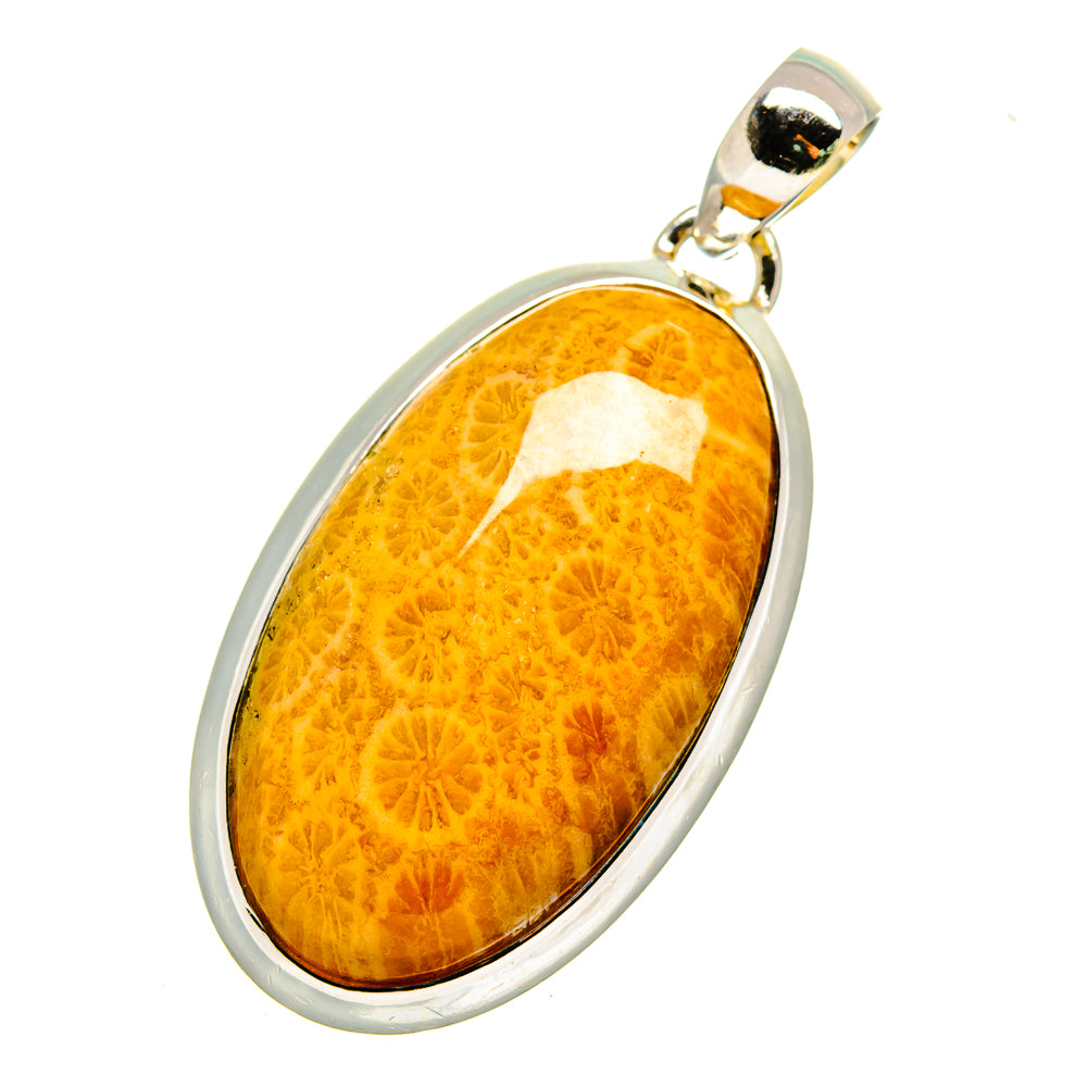 Oval orange coral pendant in sterling silver bezel with polished bail