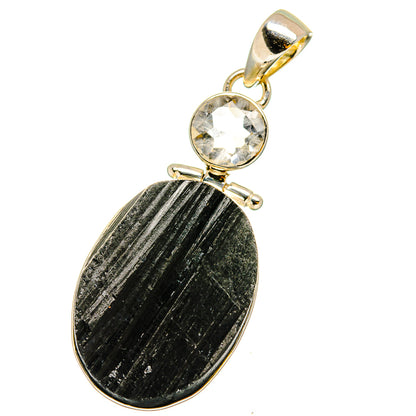 Gold-tone pendant with black oval stone and round clear quartz top bail