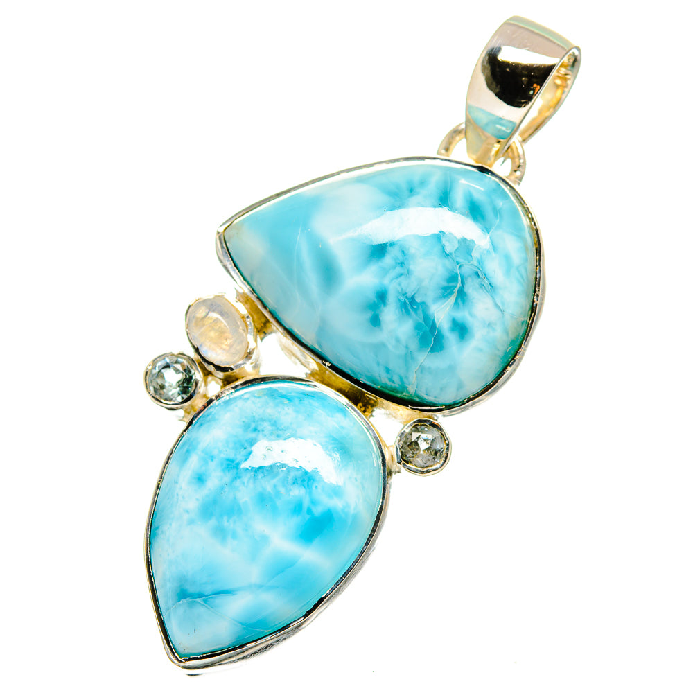 Sterling silver pendant with loop bail, two sky-blue teardrop stones, small round clear gems