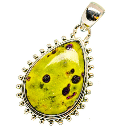 Sterling silver pendant charm with large teardrop yellow-green stone and purple spots, bail
