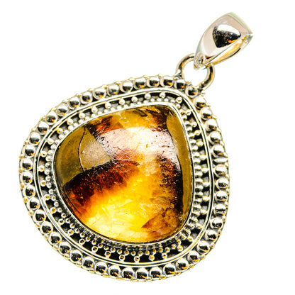 Septarian pendant with oval amber septarian stone in ornate sterling silver setting.