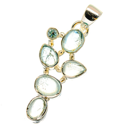 Sterling silver oval gemstone pendant with multiple light blue-green stones and bail