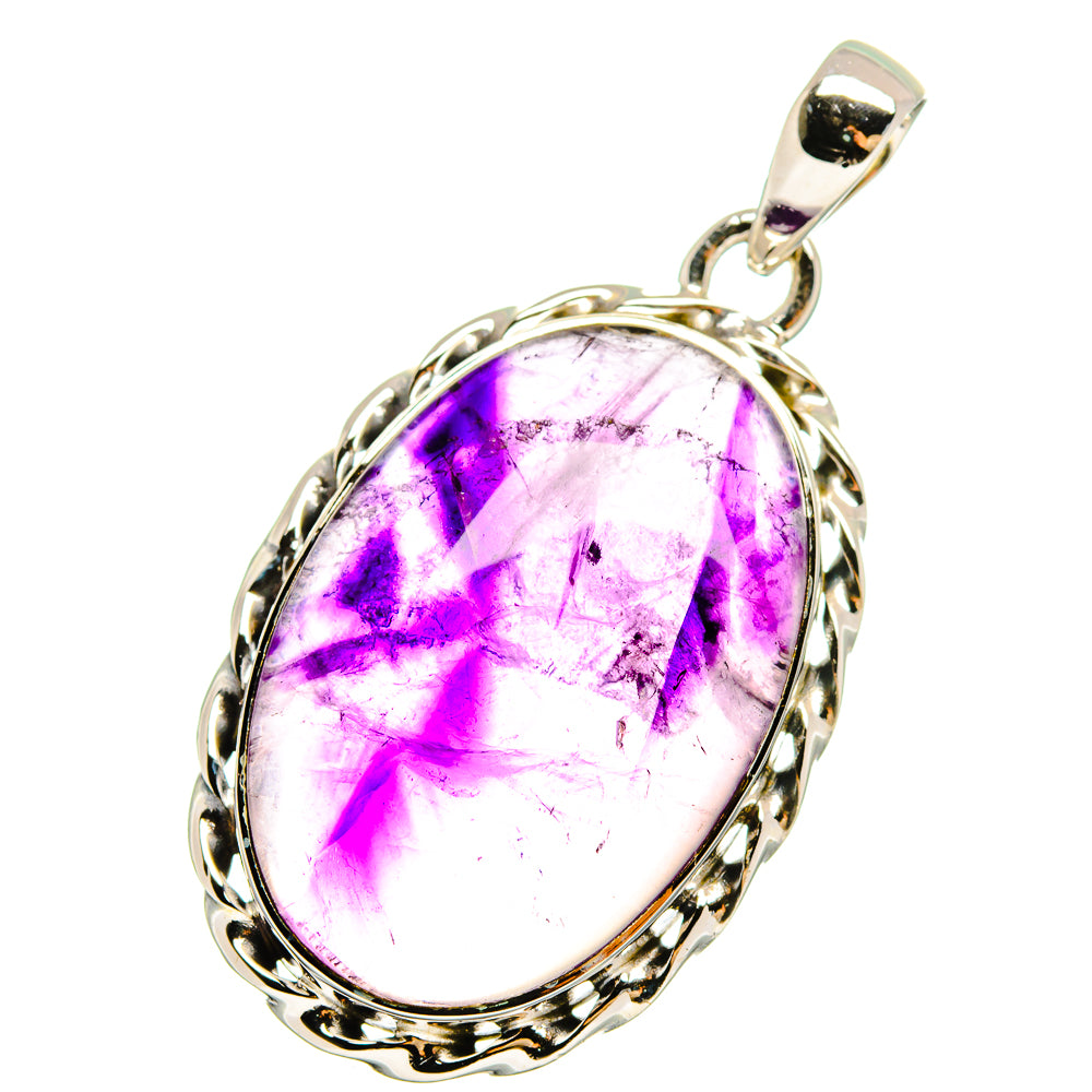 Oval amethyst pendant in silver with purple gemstone and ornate oval frame