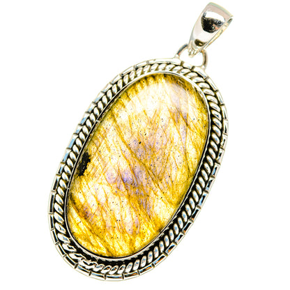 Sterling silver labradorite pendant with oval yellow stone and rope bezel