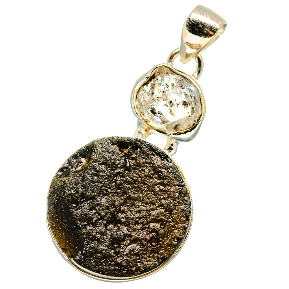 Silver pendant bail with clear Herkimer diamond set over round dark tektite disc