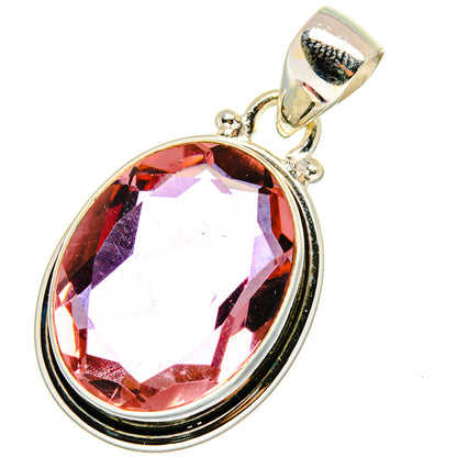 Oval alexandrite-style pendant with pink-red gemstone in sterling silver bezel
